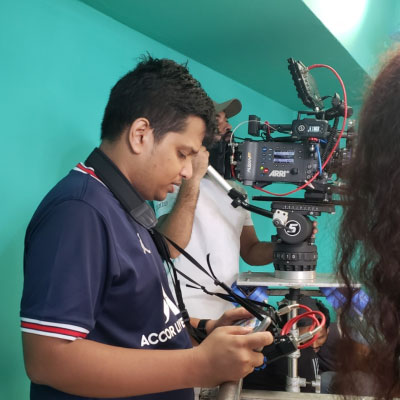 Bidhan Saha working with a camera rig